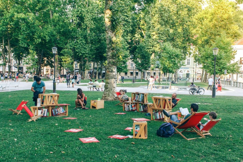 Vodnik Homestead's 'Libraries under the Treetops' initiative brings reading to parks across Slovenia every summer. Comfortable chairs are set up outdoors, drawing residents to sit, read and indulge in literature. (Photo courtesy of Miha Kovač)